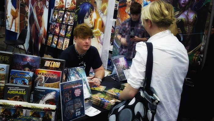 Gregbo Talks with a Fan during Heroes Con